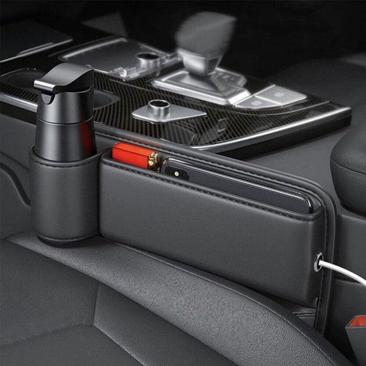 Black seat-gap organizer with cup holder installed beside the center console